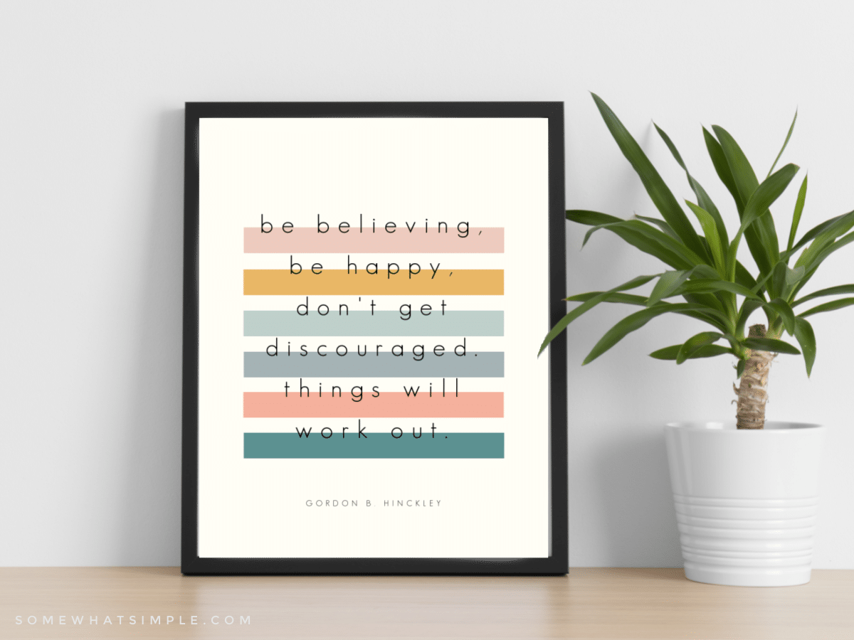 Framed printable quote next to a plant