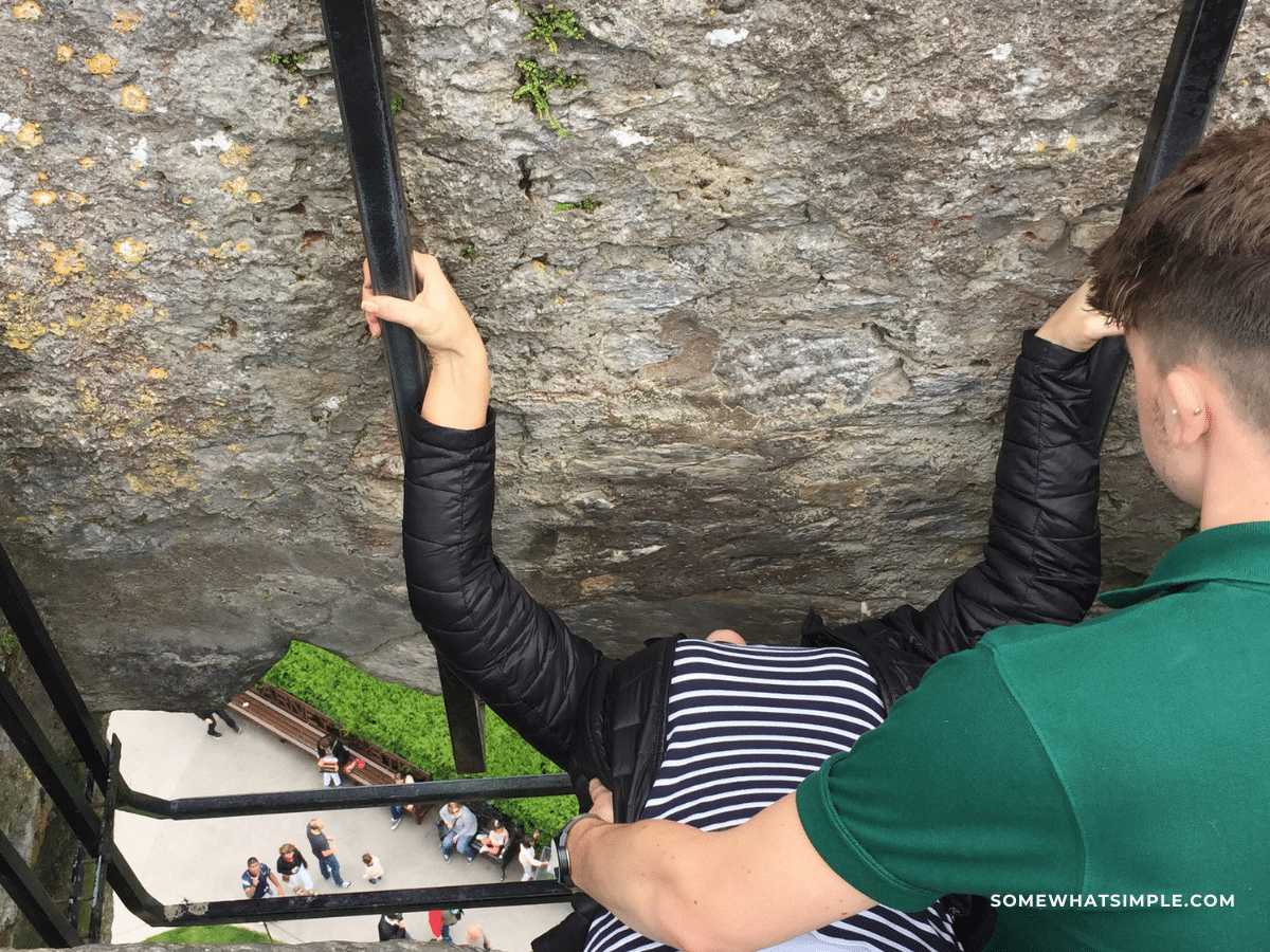 Steph kissing the Blarney Stone, Ireland