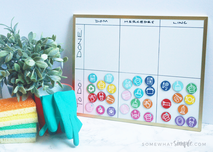 a kids chore chart that is divided into sections for multiple kids with their respective magnets in their section