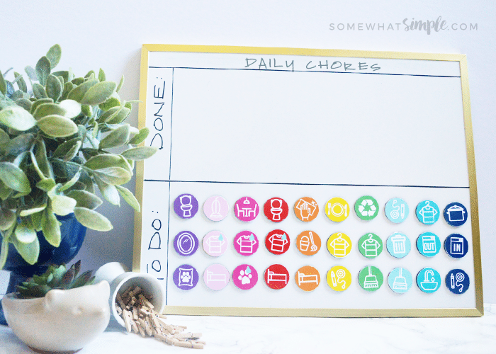 a magnetic chore chart for kids with colorful DIY magnets you can make with these printables