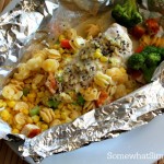 a foil packet dinner with chicken and pasta