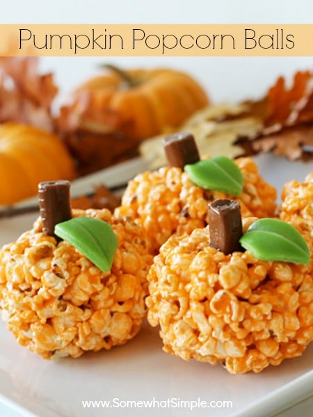 These easy Halloween Popcorn Pumpkin Balls are a fun little treat that are perfect for any fall party! via @somewhatsimple