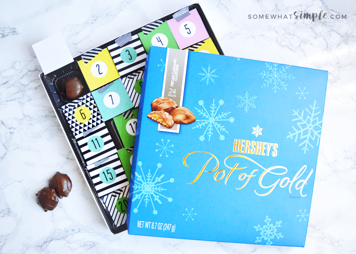 make your own chocolate christmas calendar with a box of hershey's chocolates and this adorable advent calendar printable