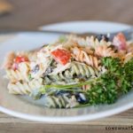 a tri-colored pasta salad made with Italian dressing