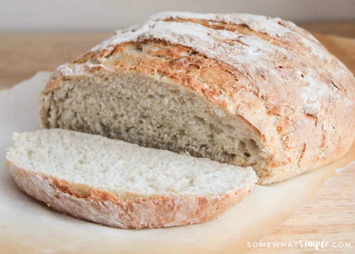 a freshly baked loaf of Quick and Easy Crusty Artisan Bread using this no knead Recipe