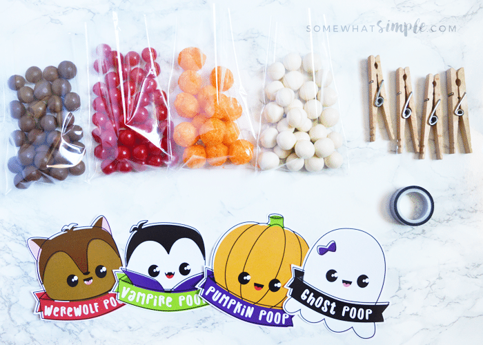 all of the supplies needed to make halloween treat bags