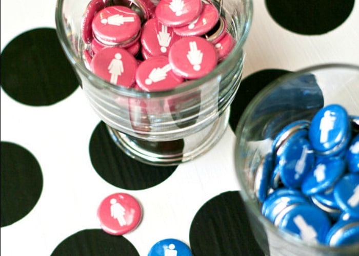 blue and pink buttons in cups are a simple gender reveal party idea