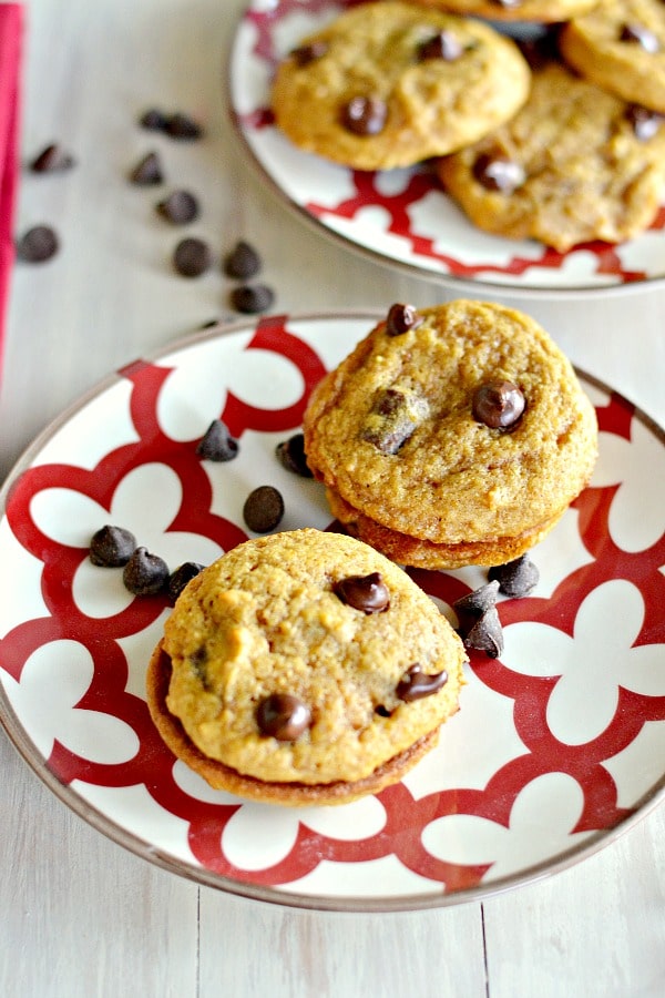 two plates of pumpkin chocolate chip cookies