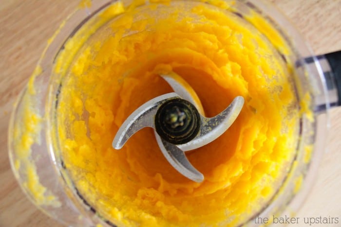 looking down into a blender filled with this homemade pumpkin puree recipe