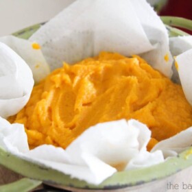 a bowl filled with this easy recipe for homemade pumpkin puree