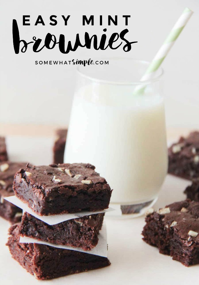 several Creme de Menthe Brownies next to a glass of milk