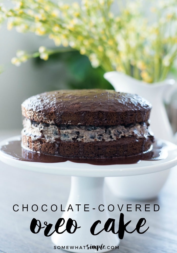 If you're looking for a simple cake that tastes amazing and will impress your party guests, this chocolate covered Oreo cookie cake recipe is for you!  Filled with pieces of Oreo cookies and smothered in chocolate, this cake will satisfy any sweet tooth! #oreocake #oreocookiecakerecipe #howtomakeanoreocake #oreocakerecipe #oreobirthdaycake via @somewhatsimple