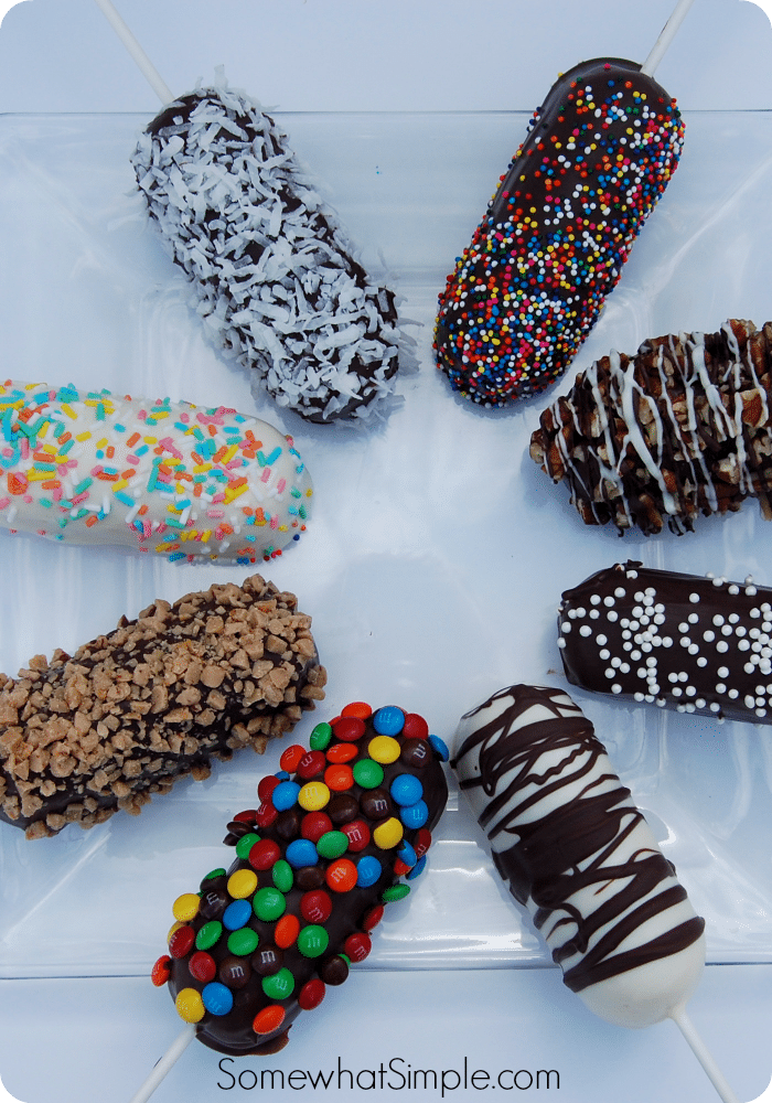 close up picture of Chocolate dipped Twinkies with different toppings and different types of chocolate