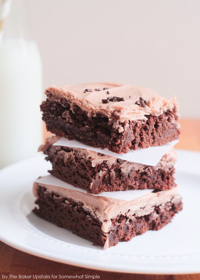 a stack of brownies with hazelnut frosting