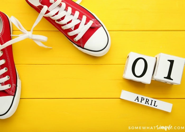 red tennis shoe on a yellow background with april first in a block calendar