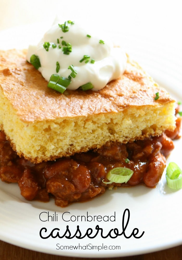 This chili cornbread casserole is the greatest combination to come together since Louis and Vuitton.  This easy recipe combines two of my favorite dinner foods into one delicious casserole. #chilicornbreadcasserole #cornbread #easydinner #chilicasserole via @somewhatsimple