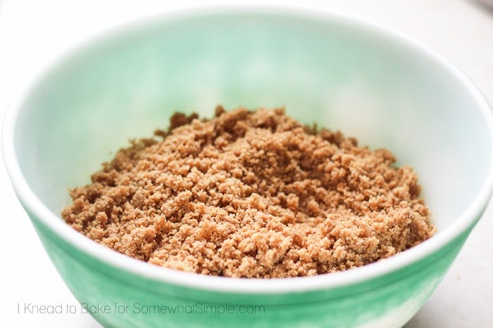 crush graham crackers in a bowl