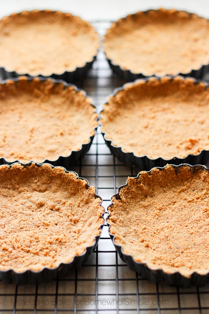 graham cracker crust in mini pie tins