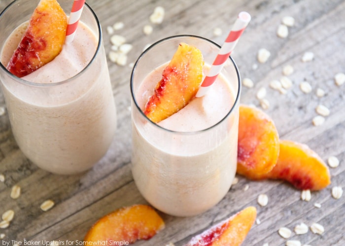 two glasses of a healthy peach smoothie