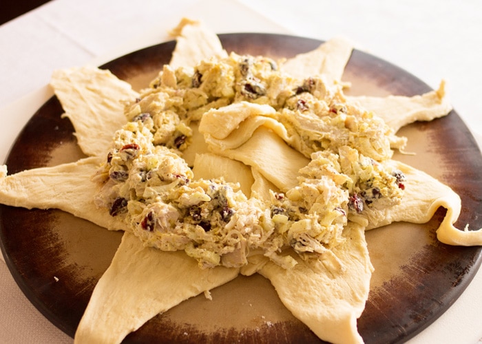 turkey mixture placed in a ring on croissant dough