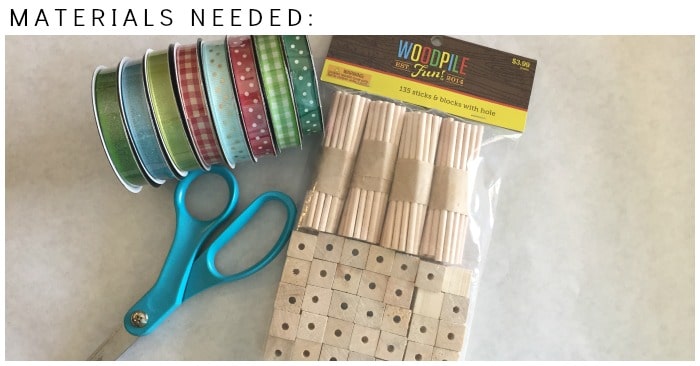 scissors, ribbon and a package of wood sticks and blocks
