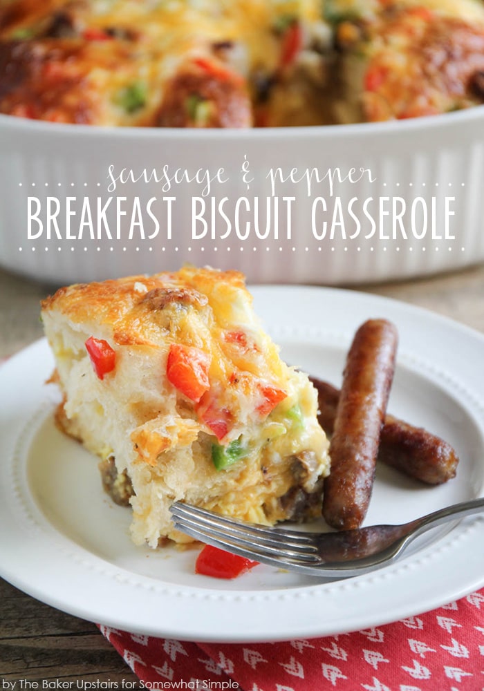 This easy sausage breakfast casserole recipe made is a delicious twist on a breakfast classic!  Filled with biscuits, savory sausage, eggs and peppers, this breakfast casserole is a perfect way to start your day. #breakfast #recipe #easyrecipe #casserole #breakfastbiscuitcasserole via @somewhatsimple