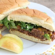 a black bean burger on a plate cut in half