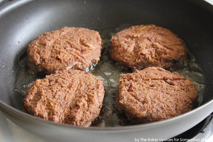 frying black bean burgers in a frying pan