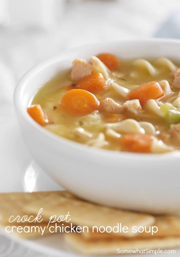 This Crock Pot Creamy Chicken Noodle Soup Is Easy To Put Together And Amazingly Delicious!  Filled With Noodles, Tender Chicken And Delicious Vegetables, This Comfort Food Is Perfect For Soothing You When You're Sick Or On A Cold Winter Day. #chickennoodlesoup #crockpotrecipe #crockpotcreamychickennoodlesoup #chickennoodlesouprecipe #easyrecipe #soup #comfortfood via @somewhatsimple