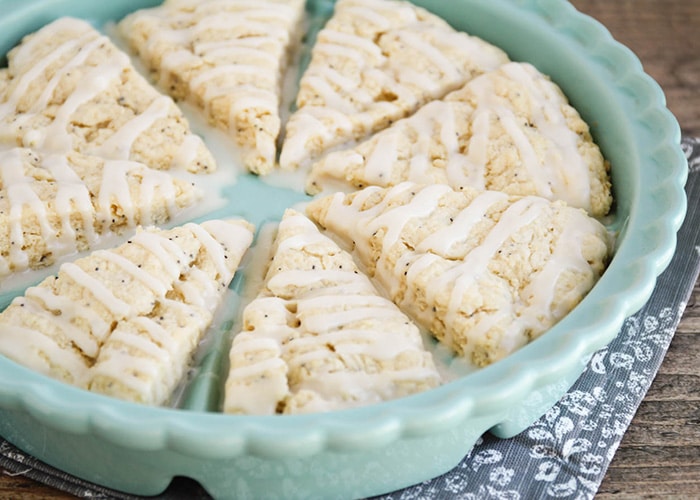 Almond Poppy Seed Scones topped with a glaze