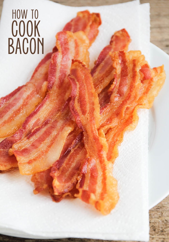 a plate of bacon on a white plate made using the best way to cook bacon