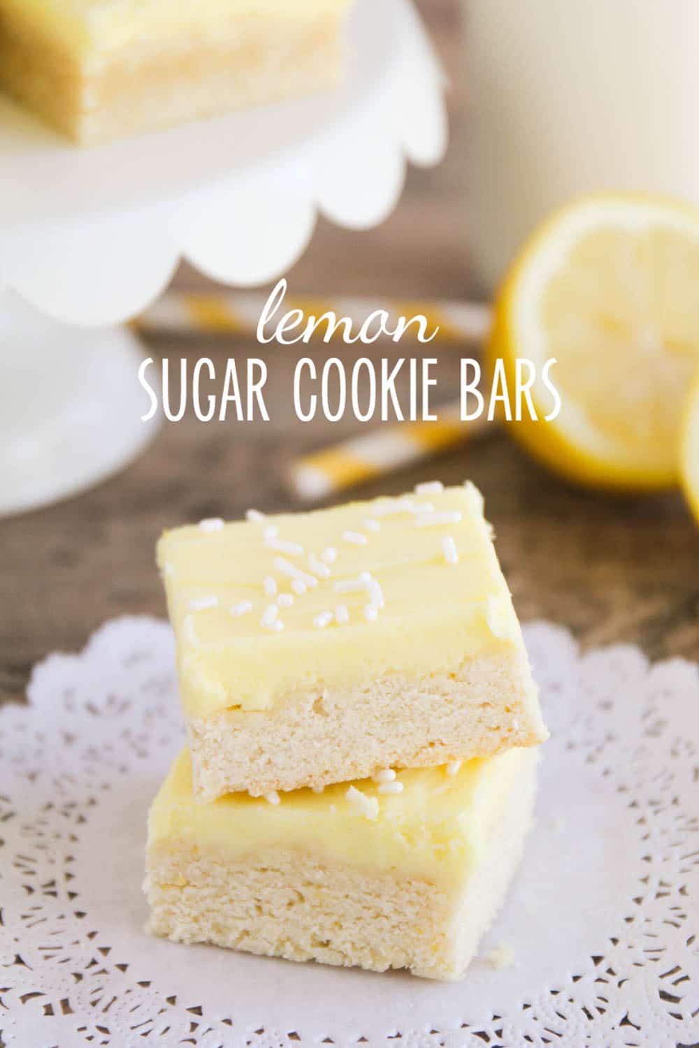 These sugar cookie lemon bars have all the deliciousness of sugar cookies, but without the rolling and cutting.  This tasty lemon bars are topped with an incredible lemon buttercream frosting! #dessert #dessertrecipes #lemondessert #sugarcookies #lemonrecipeideas #lemonsugarcookiebars via @somewhatsimple