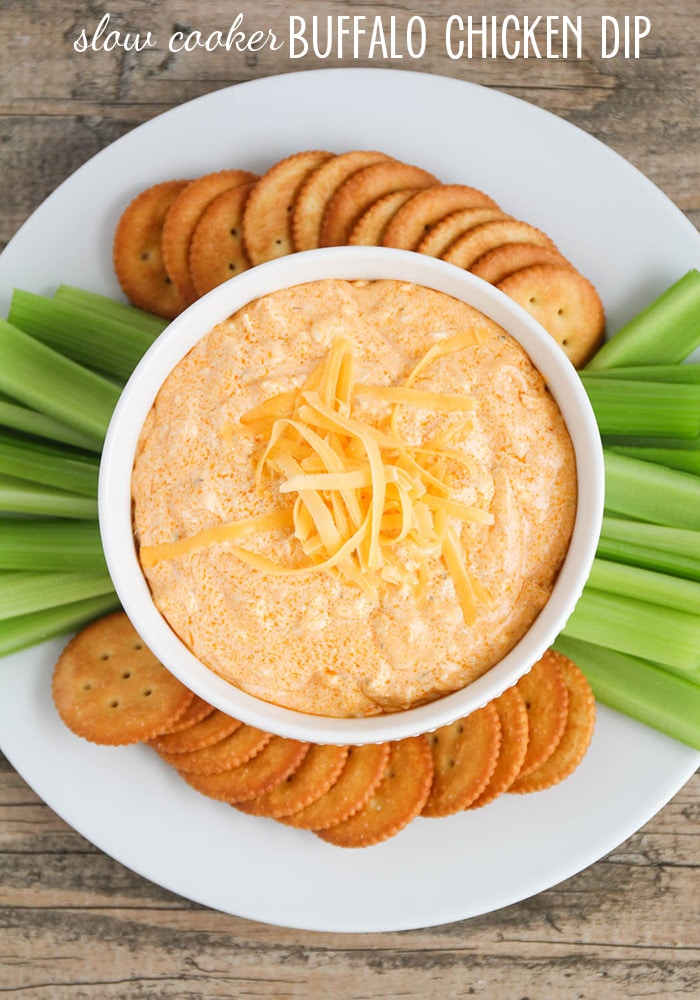 This delicious crock pot buffalo chicken dip recipe an easy appetizer that is sure to please!  Just throw a few easy ingredients into your slow cooker and you will have a delicious appetizer in minutes! #buffalochickendip #crockpotbuffalochickendip #buffalochickendiprecipe #buffalochickendip #howtomakebuffalochickendip #slowcookertbuffalochickendip via @somewhatsimple