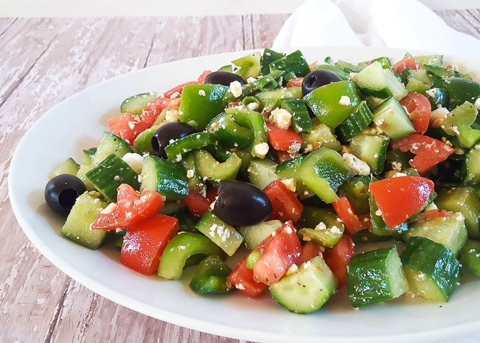 This Greek Salad recipe is full of hearty and bold flavors, but it's a cinch to pull together. Serve it as a side dish or even as a light dinner!