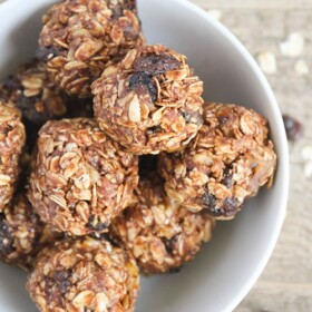looking down on a bowl of no bake energy bites made with oats and raisins
