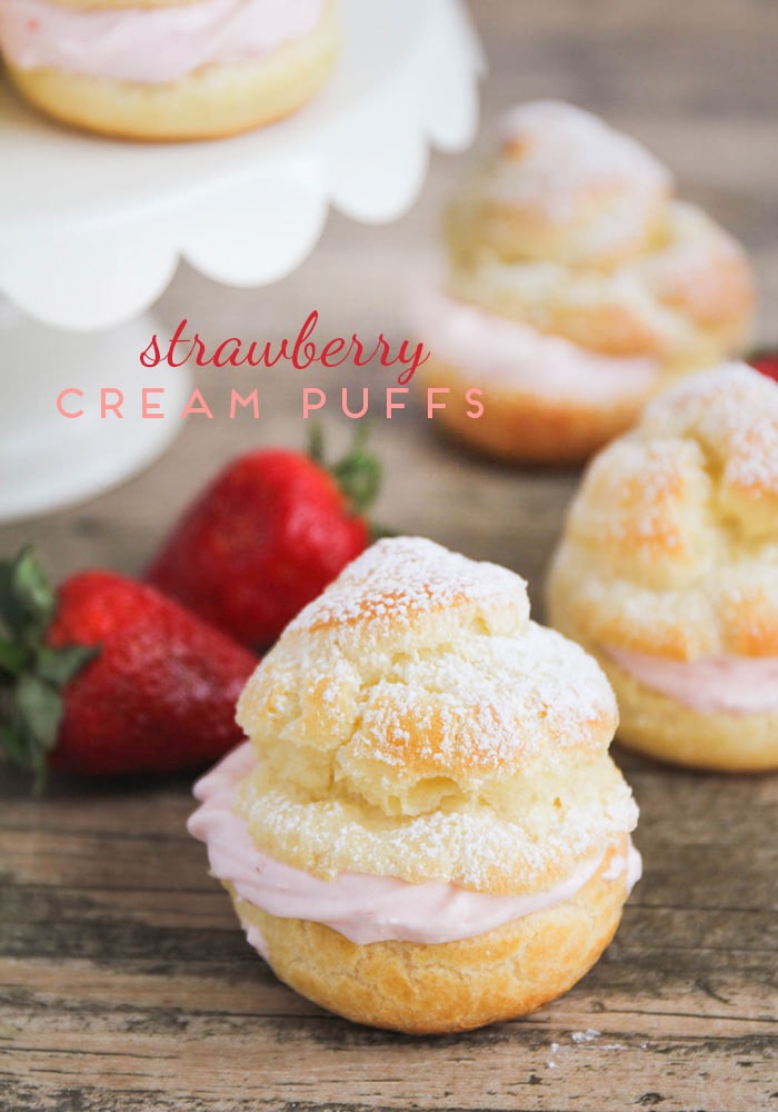 Strawberry cream puffs are simple to make and so delicious! Tender pastry shells filled with sweet strawberry whip cream make an easy, elegant dessert. via @somewhatsimple