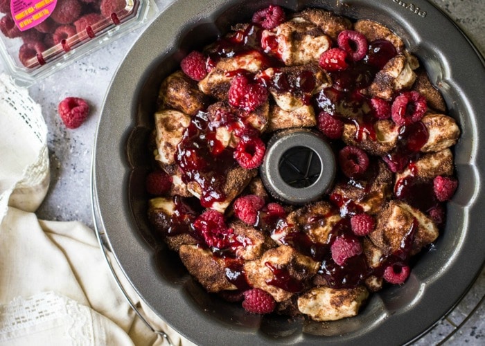 looking down on a cake pan filled with a raspberry dessert