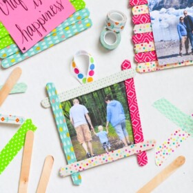 These colorful washi tape popsicle stick frames are so much fun to make with the kids to give as gifts or hang on the fridge.