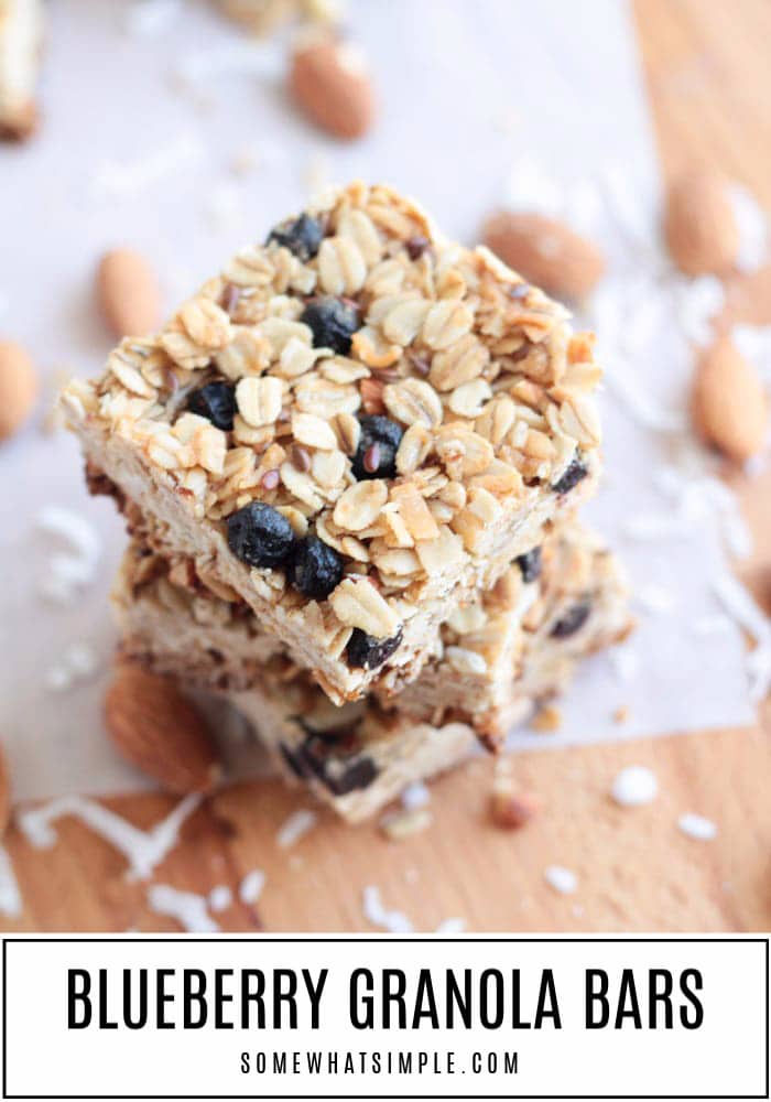 Blueberry granola bars are packed with goodness! Crunchy almonds and flax seeds, sweet blueberries and chewy coconut. They take only a few minutes to mix up, and are incredibly easy to make! #blueberrygranolabars #healthyblueberrygranolabars #blueberrygranolabarsrecipe #howtomakegranolabars #easygranolabarrecipe via @somewhatsimple