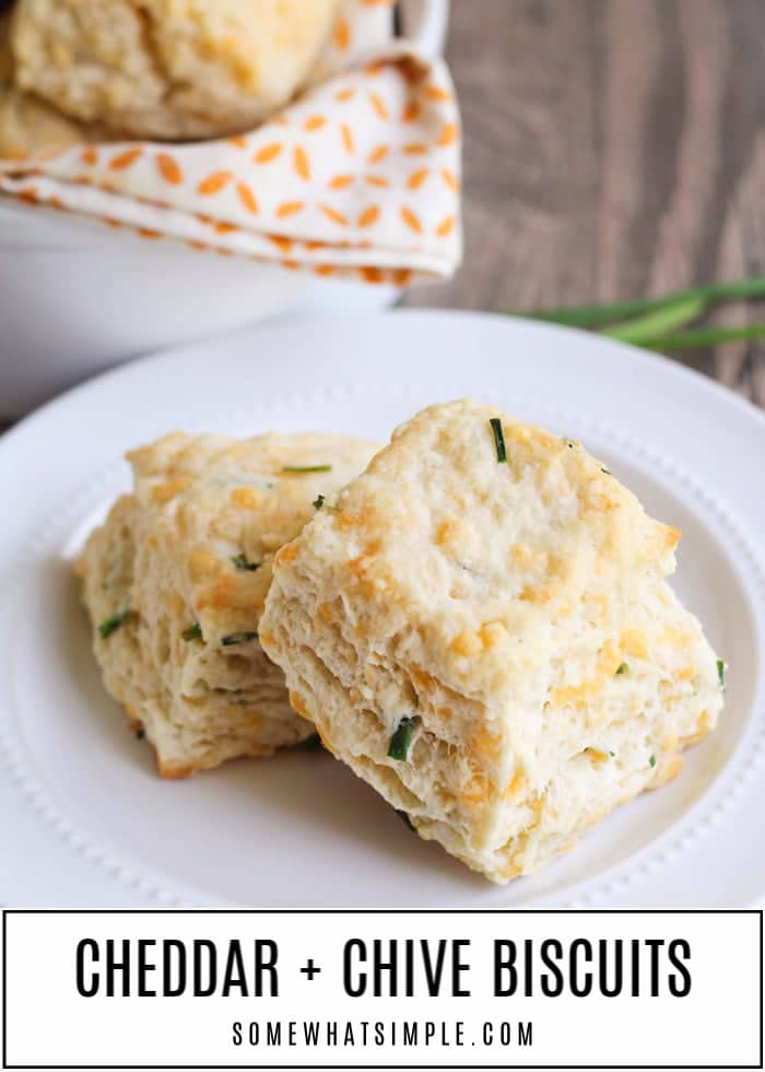 Soft, savory, flaky, and filled with cheddar cheese and chives - these Cheddar and Chive Biscuits are unbelievably easy to make and can be ready in just 20 minutes! #chiveandcheddarbiscuits #cheddarbiscuits #easycheddarbiscuitsrecipe #cheddarbaybiscuits #copycatredlobsterbiscuits via @somewhatsimple