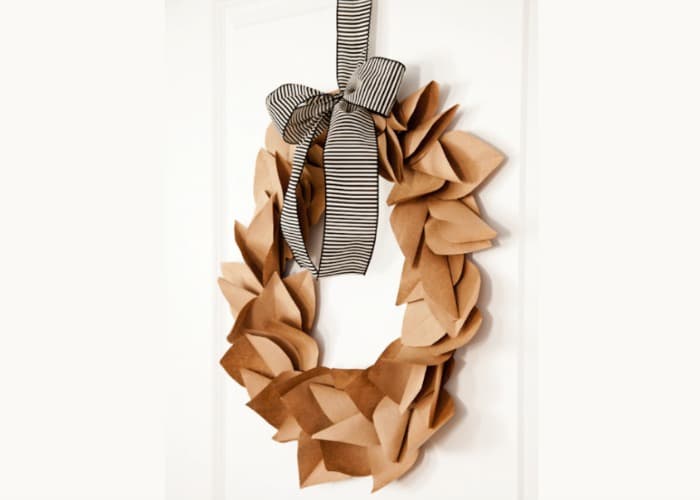 20 of the coolest Paper Bag Crafts like this brown paper bag door wreath