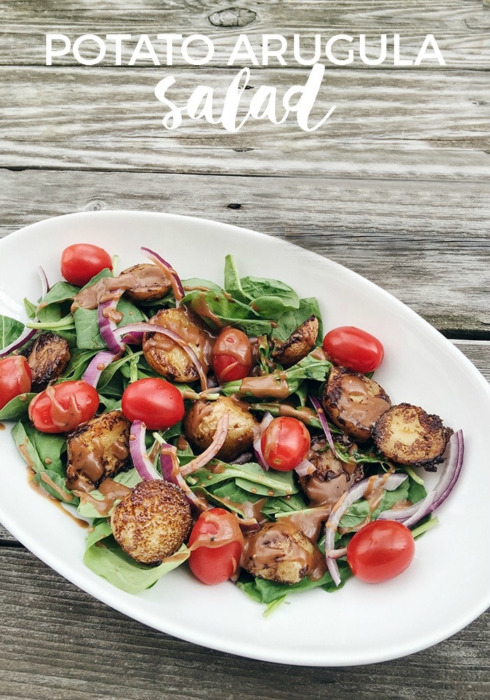 This potato arugula salad uses fresh ingredients and is easy to prepare.  It makes a healthy meal or is the perfect compliment for just about any dinner recipe. #summerbbq #bbqsidedish #potatoearugulasalad #summersalad #easysummersalad via @somewhatsimple