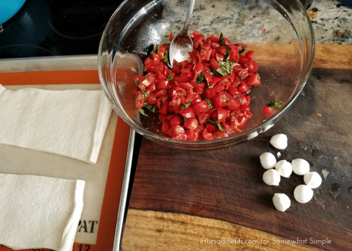 Simple Caprese Calzones recipe on somewhatsimple.com