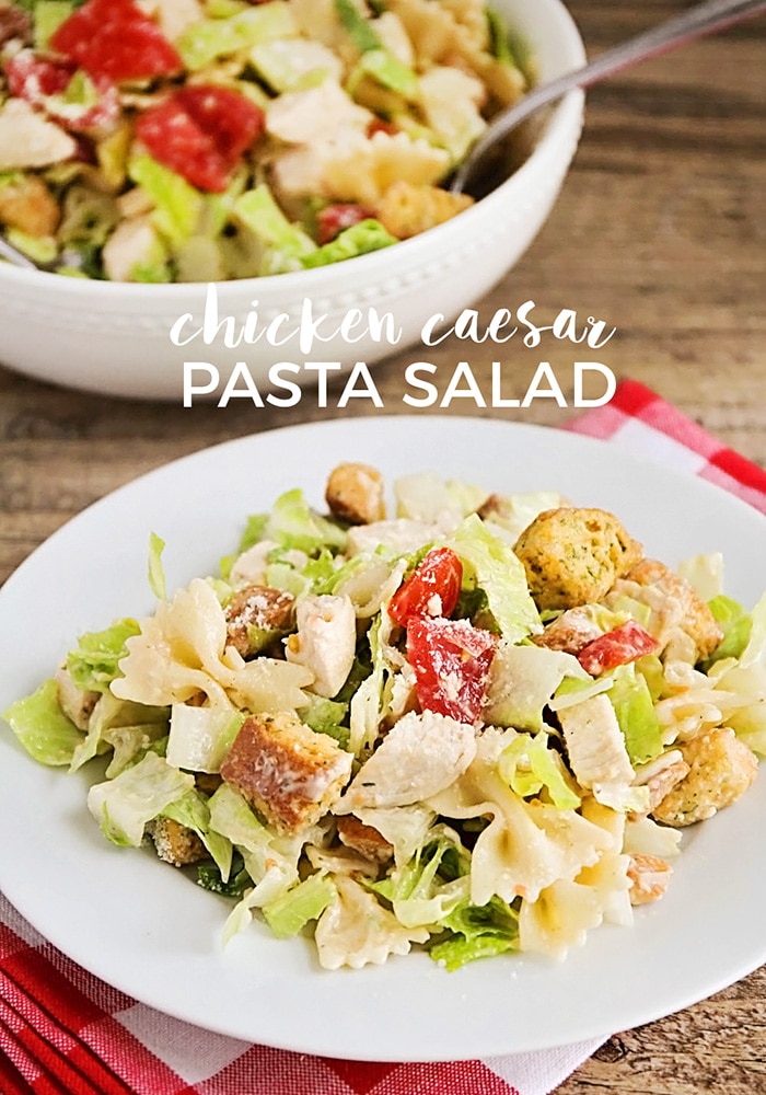 This chicken caesar pasta salad is so fresh and delicious, and ready in less than thirty minutes. Loaded with chicken, pasta and Caesar dressing, this salad is perfect for potlucks, parties and barbecues! #chickenpastasalad #caesarpastasalad #potluckrecipe #easysummersalad #chickencaesarpastasaladrecipe via @somewhatsimple