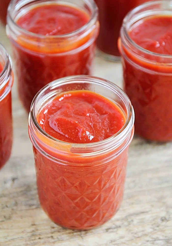 Mason jars filled with Homemade bbq Sauce