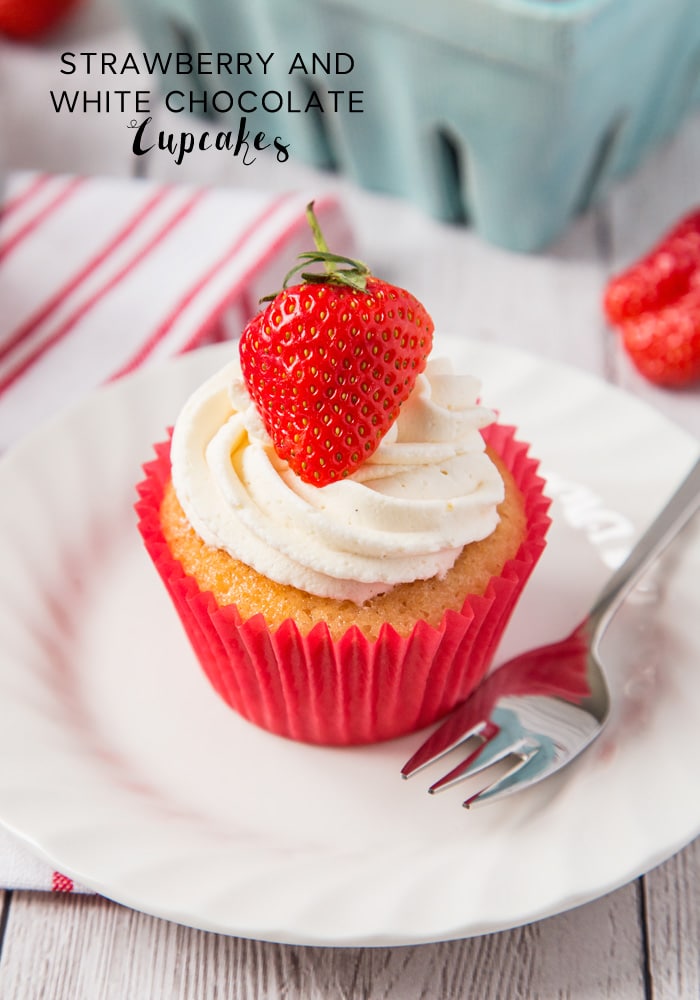 Strawberry and White Chocolate Cupcakes: Soft, sweet and packed with fresh strawberries; these are an easy dessert the whole family will love! I decided to make some Strawberry and White Chocolate Cupcakes to take full advantage of the juicy, sweet strawberries filling the supermarket shelves right now. #cupcakes #whitechocolate #strawberrywhitechocolatecupcakes #dessertrecipe #easyrecipe via @somewhatsimple