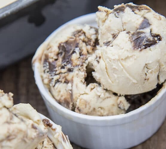 chocolate peanut butter ice cream sccops in a white dish
