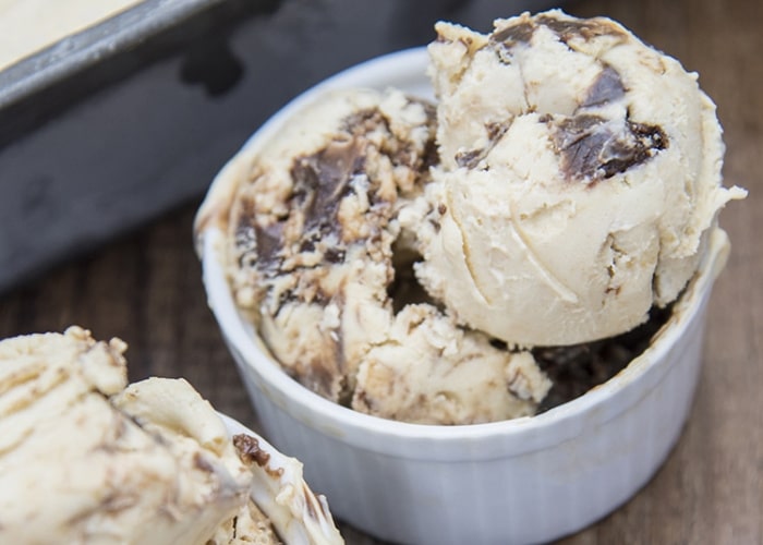 chocolate peanut butter ice cream sccops in a white dish