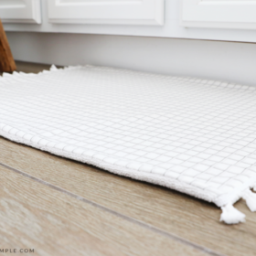 a DIY Bath Mat on the floor in the bathroom