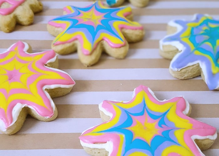 Tie dye sugar cookies are a fun and delicious way to celebrate the colors of summer!